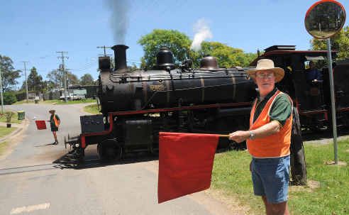 Flagmen Brian Davis and Geoff Johanson will man the level crossing at Dagun Station for the final time on November 21, marking the end of an historic tradition. Flagmen Brian Davis and Geoff Johanson will man the level crossing at Dagun Station for the final time on November 21, marking the end of an historic tradition.